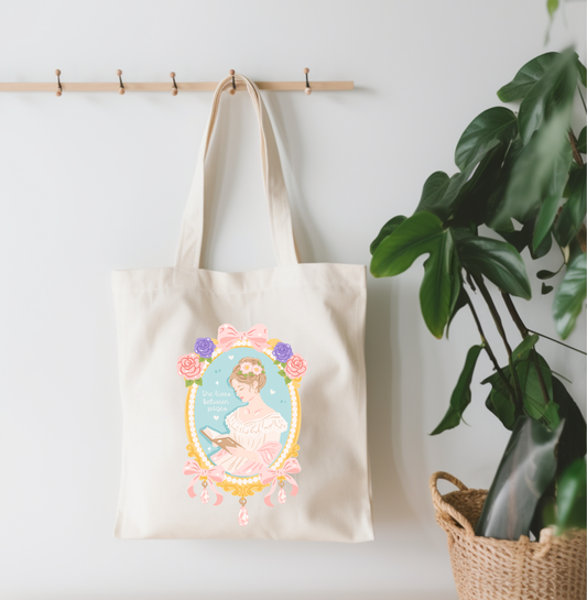 She Lives Between Pages Canvas Tote Bag